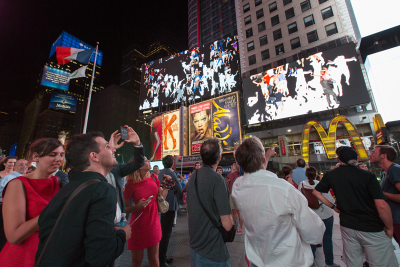 Storming Times Square by Daniel Canogar, 2014