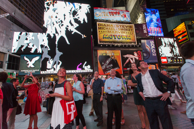 Storming Times Square by Daniel Canogar, 2014